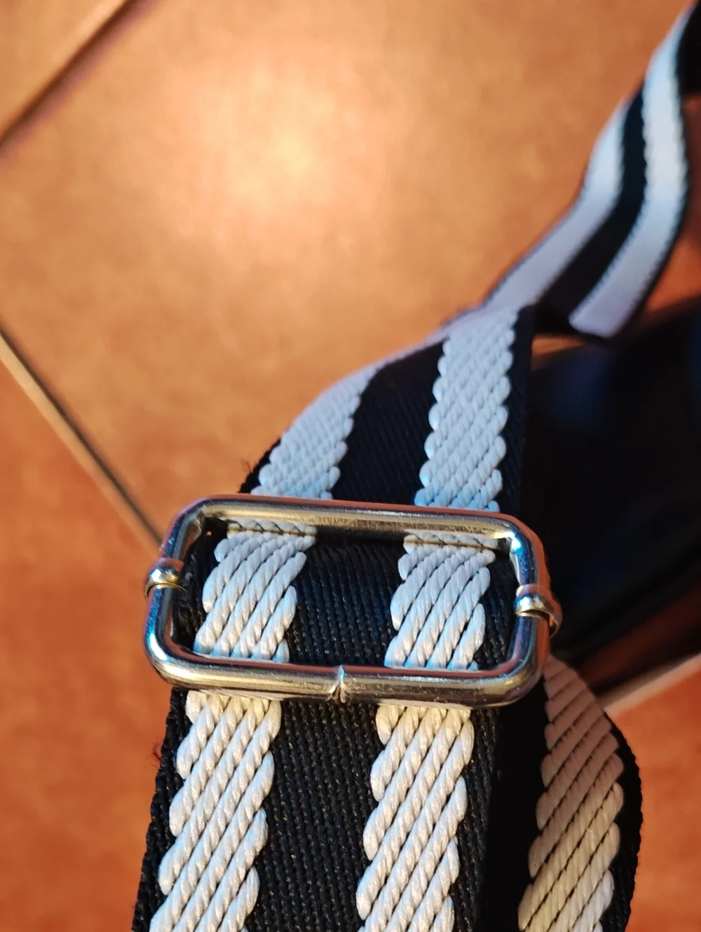 Ulta Beauty Black Leather Crossbody Belt Bag with Black-and-White Striped Strap